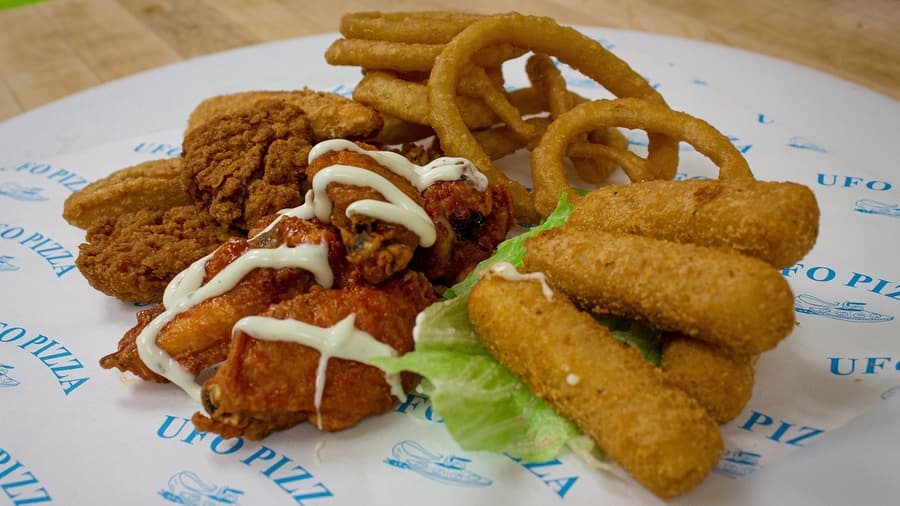Wings, onion rings, chicken strips and mozza sticks